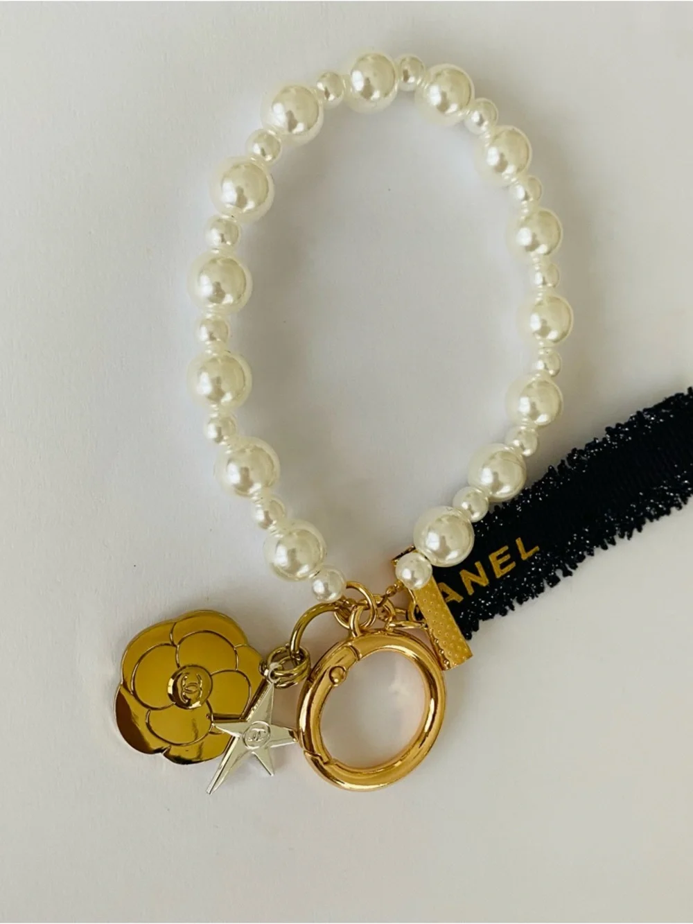 New Chanel VIP GWP Navy Metallic Ribbon Pearls Camellia Star Key Chain Bag Charm - Picture 3 of 8